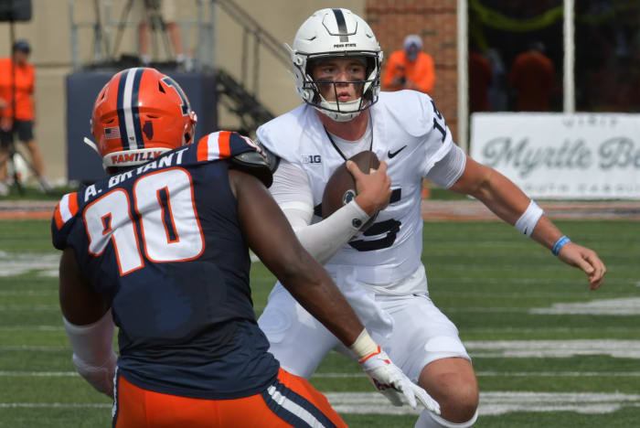 Penn State quarterback Drew Allar carries the ball against Illinois in a Big Ten Conference football game.